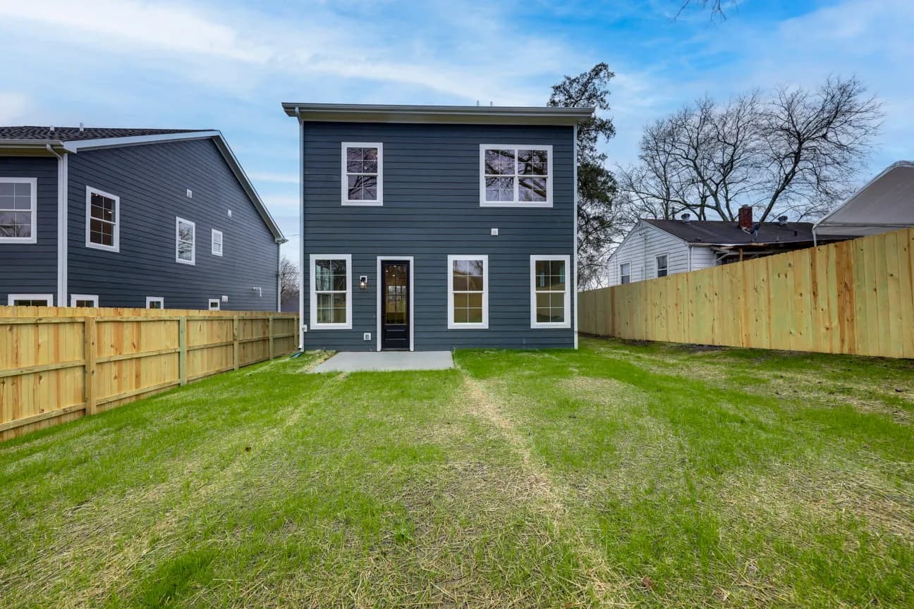 Fully fenced backyard behind the completed home