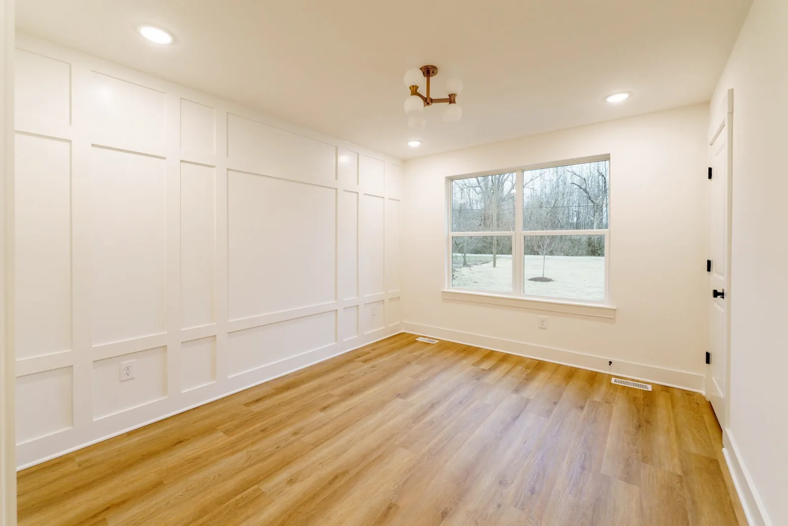 Study with full-height paneled walls